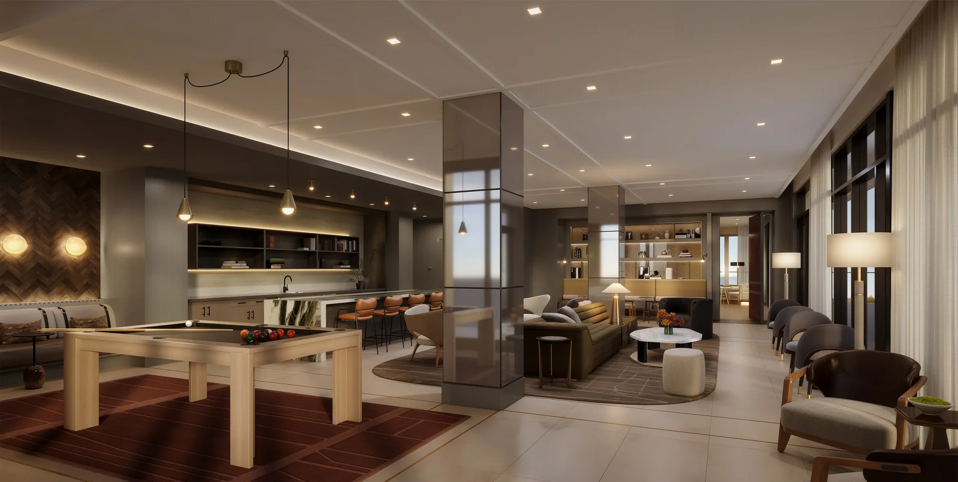 Spacious resident clubroom with game table and lounge seating at Westbend Residences
